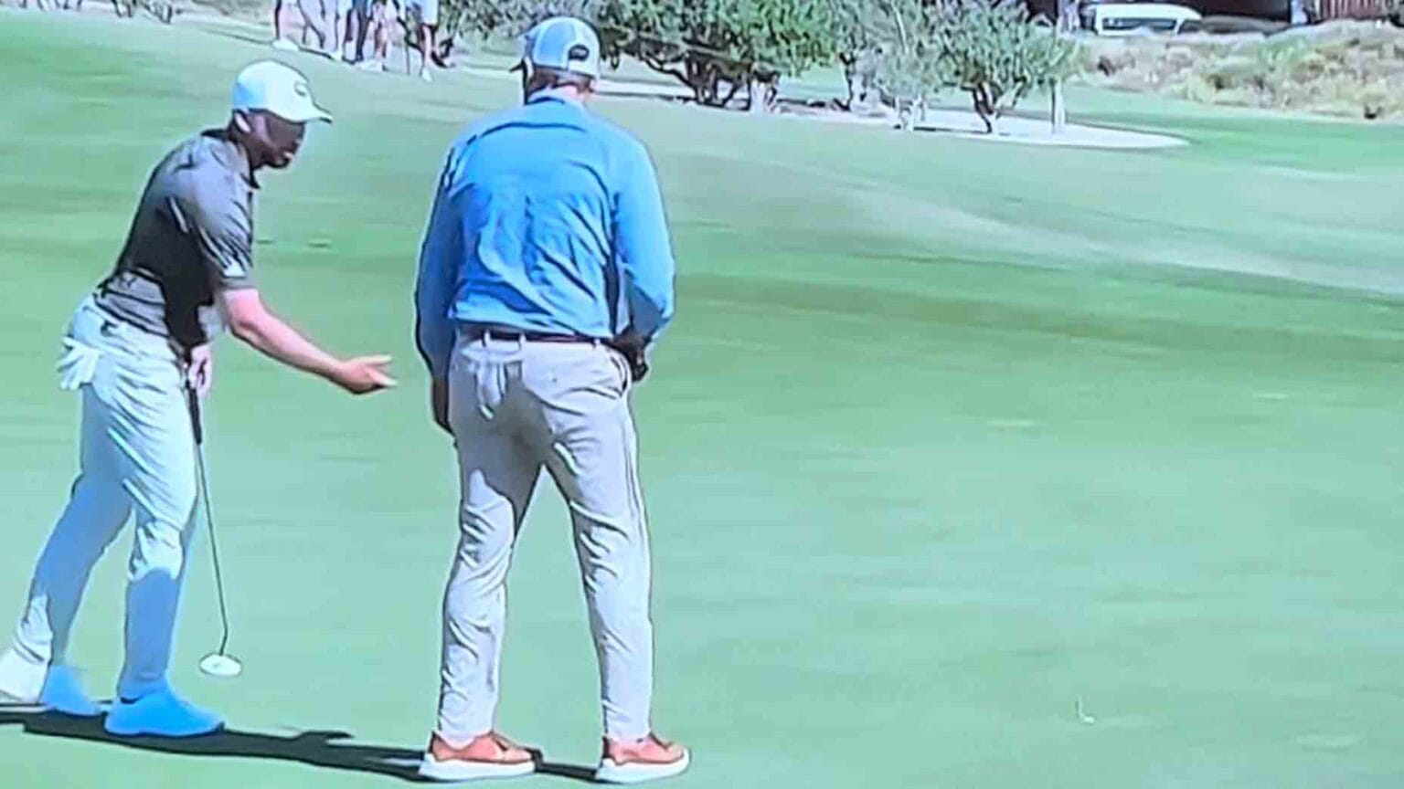 Tour pro confused by rules situation, playing partner cracks wise.