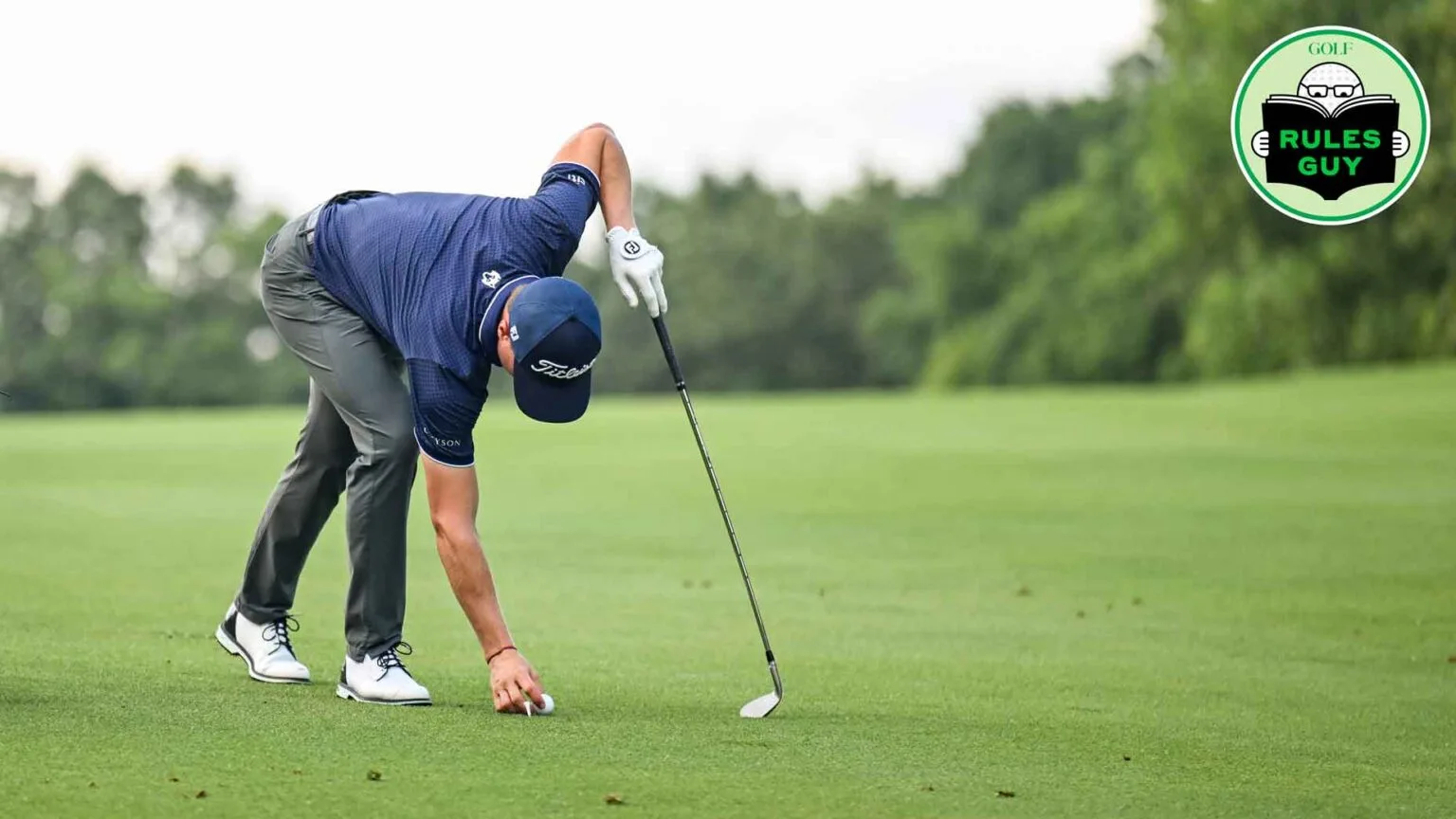 Is it allowed to keep your club-length marker on the ground while you take your shot?