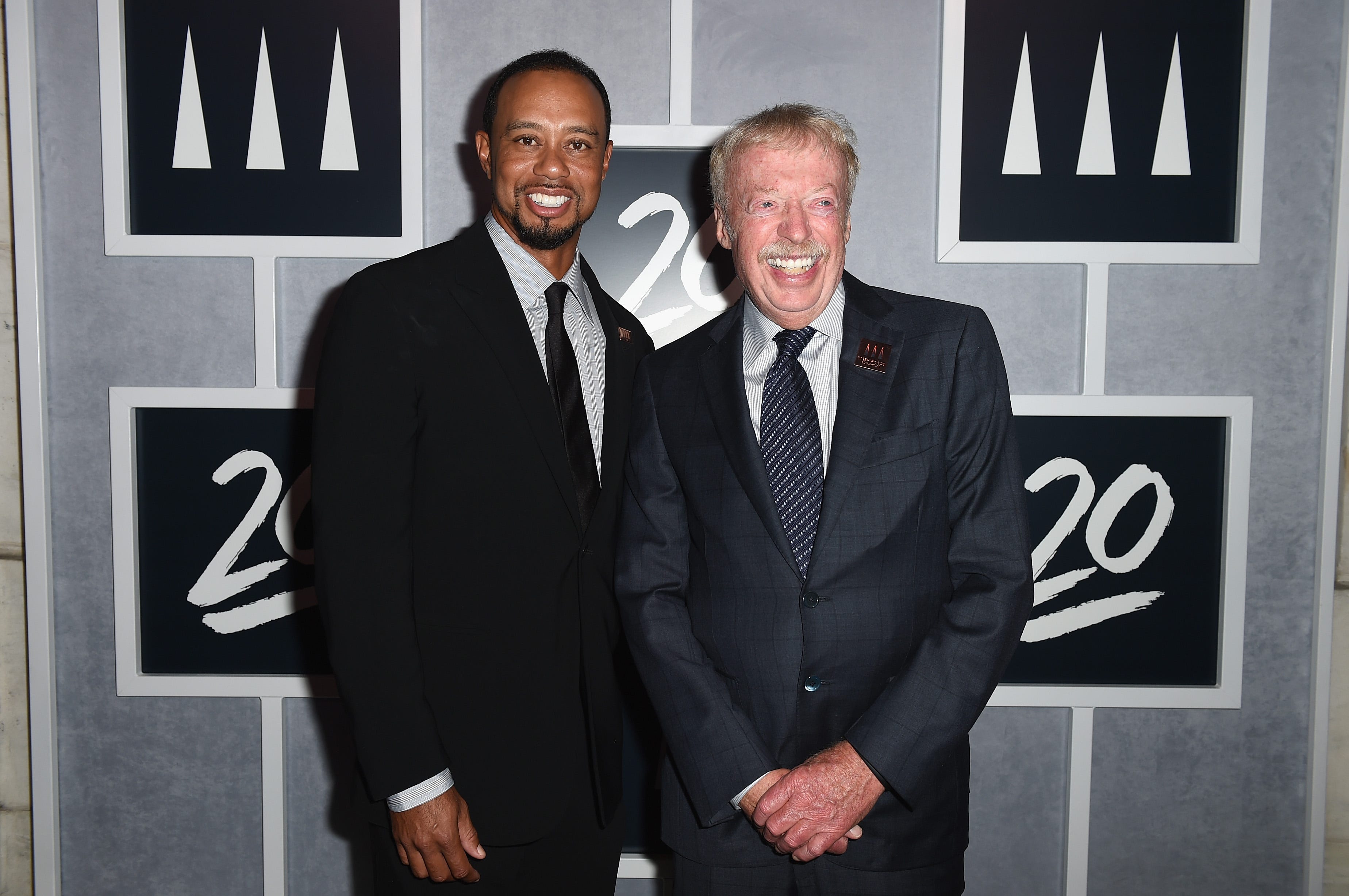 Tiger Woods with Phil Knight