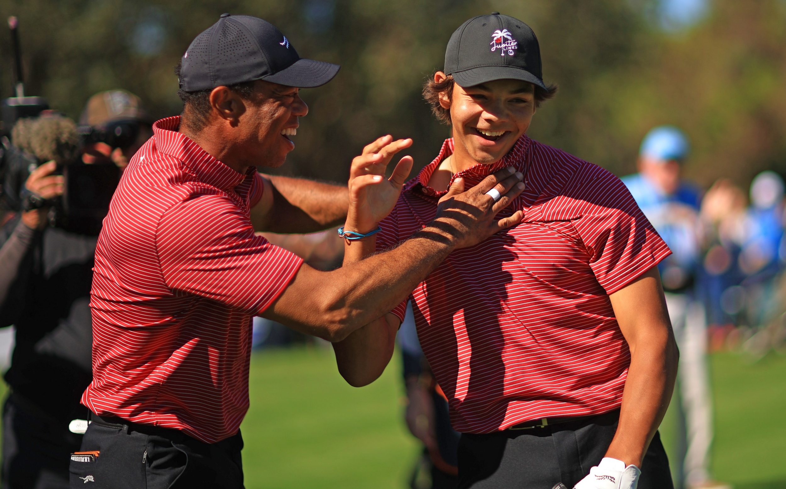 Tiger Woods rejoices with Charlie Woods at the PNC Championship